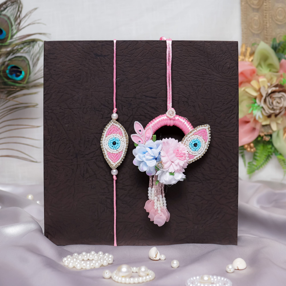 Image of Elegant Pink Evil Eye Bhai Bhabhi Rakhi Pair