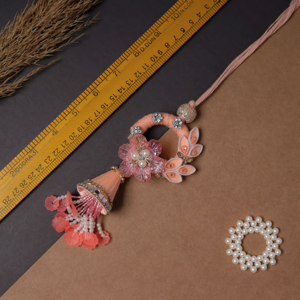 Elegant Peach Bhai Bhabhi Rakhi Pair | Traditional Lumba Rakhi Set