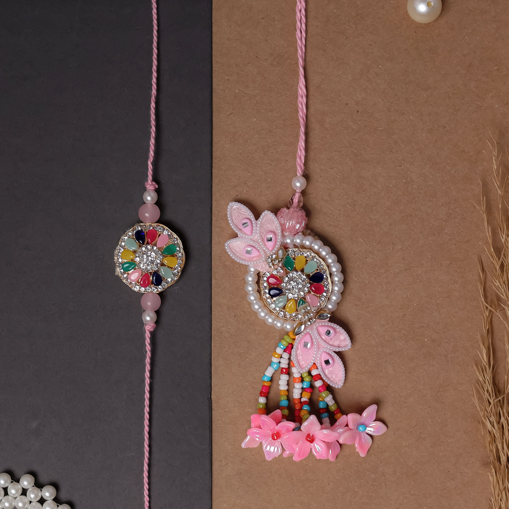 Image of Elegant Pink Bhaiya Bhabhi Rakhi Set | Matching Couple Rakhi Pair with Floral Accents