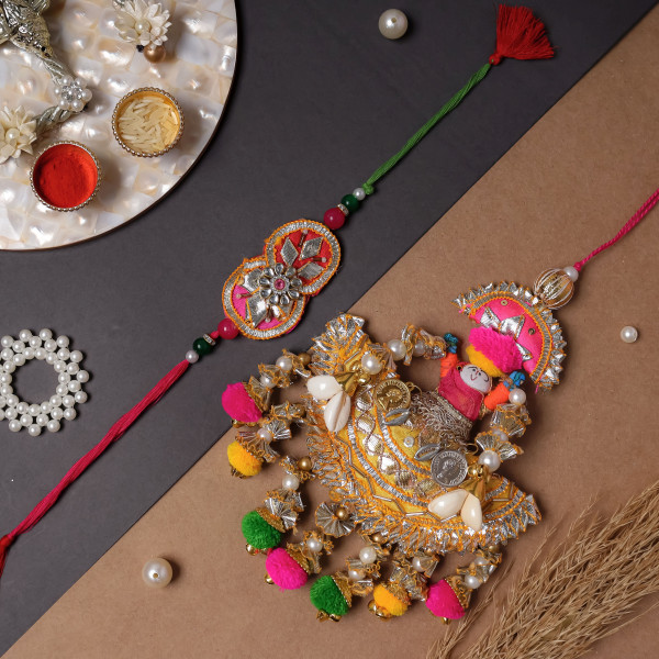 Handcrafted Bhai Bhabhi Puppet Rakhi Pair – Vibrant Multi-Color Gota Work