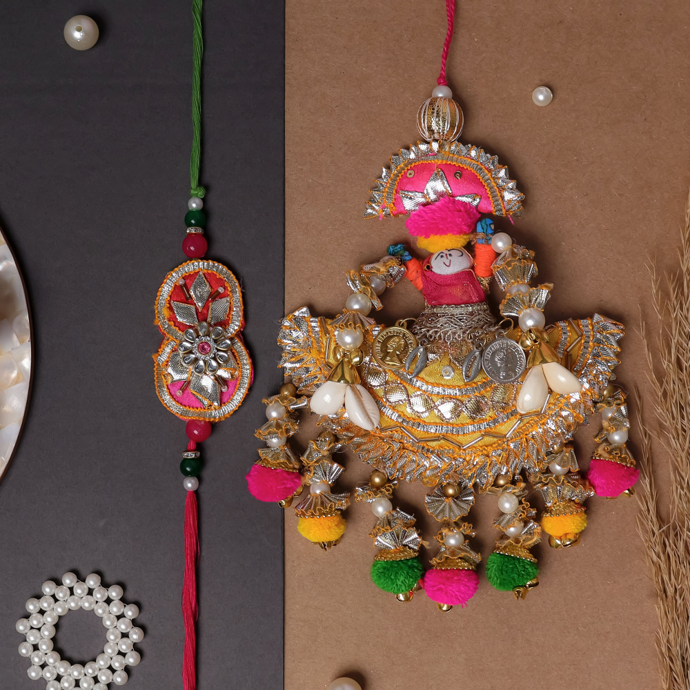 Image of Handcrafted Bhai Bhabhi Puppet Rakhi Pair – Vibrant Multi-Color Gota Work