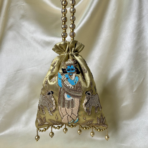 Golden Tissue Hand-Embroidered Krishna Cow Potli Bag – Zardozi & Sequin Festive Wedding Potli
