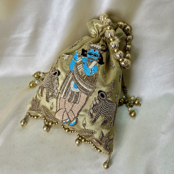 Golden Tissue Hand-Embroidered Krishna Cow Potli Bag – Zardozi & Sequin Festive Wedding Potli