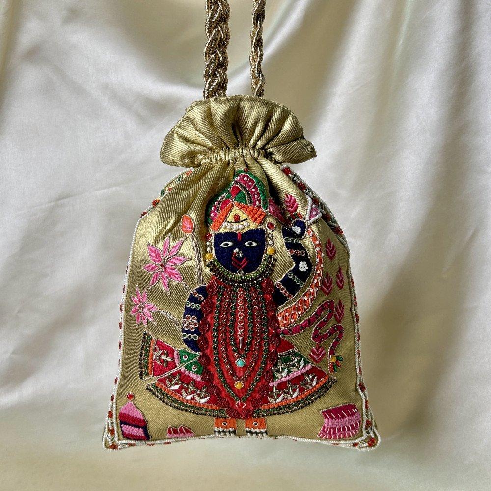 Image of Golden Tissue Hand-Embroidered Shreenathji Zardozi Pearl Festive Potli Bag