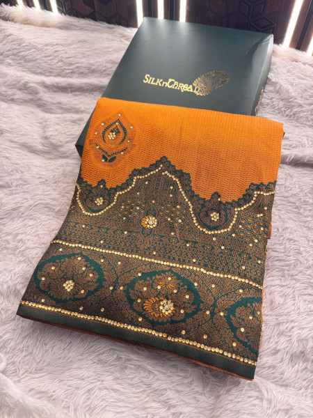 Kanjeevaram Silk Saree with Copper Zari woven And Stone Work