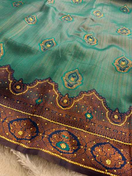 Kanjeevaram Silk Saree with Copper Zari woven And Stone Work