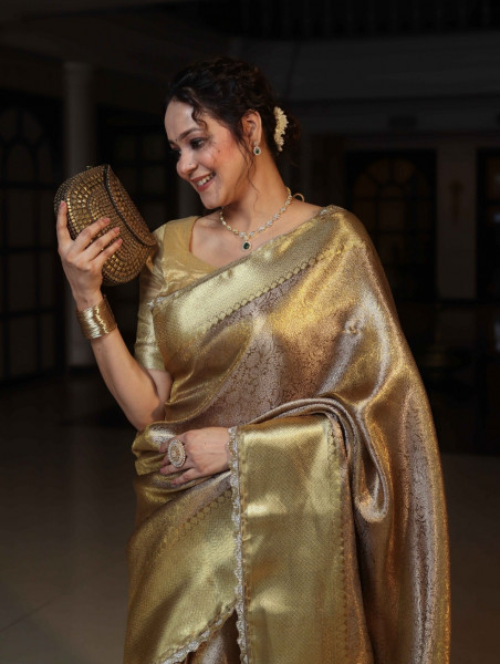 Premium Tissue Silk Saree with Silver Zari Design and Cutdana Work on Border