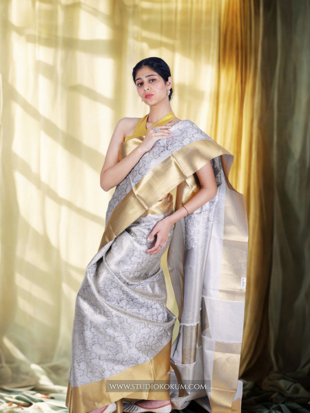 Navya: Golden Silver Tissue Silk Saree