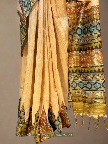 Dhriti : Beige color tussar silk saree with Kalamkari Border (With Blouse)