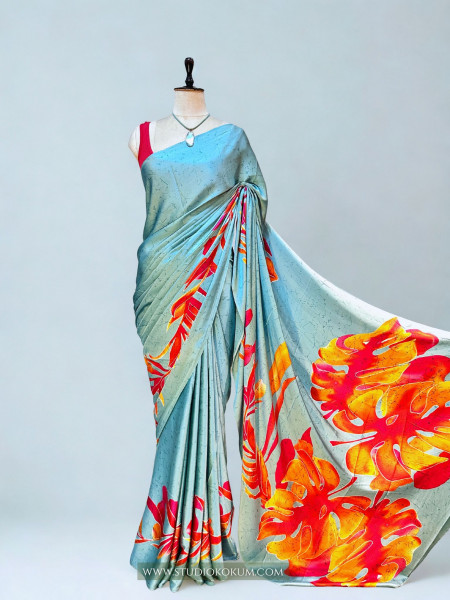 Scarlet Sky: Blue Floral Print Satin Silk Saree