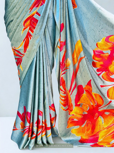 Scarlet Sky: Blue Floral Print Satin Silk Saree
