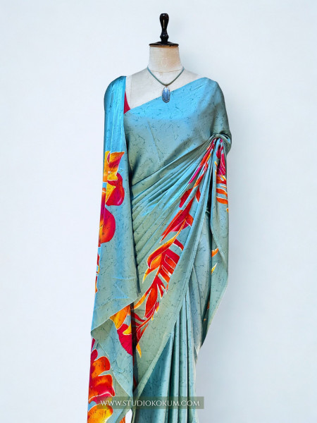 Scarlet Sky: Blue Floral Print Satin Silk Saree