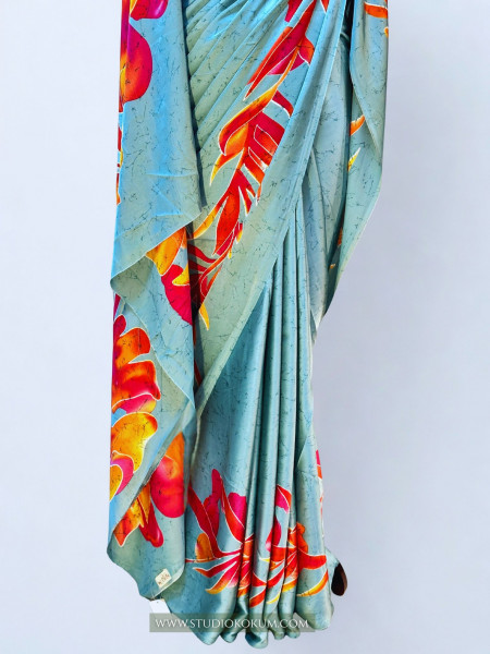 Scarlet Sky: Blue Floral Print Satin Silk Saree