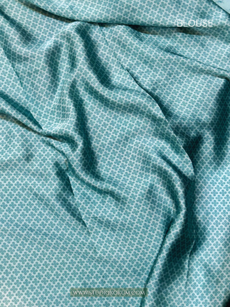 Scarlet Sky: Blue Floral Print Satin Silk Saree