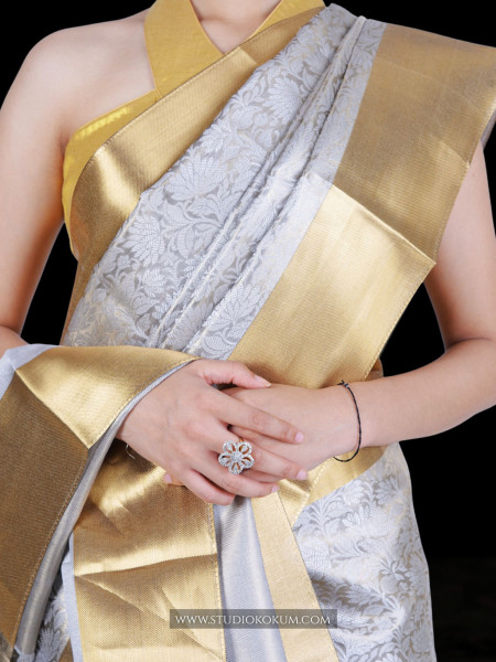 Navya: Golden Silver Tissue Silk Saree