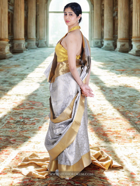 Navya: Golden Silver Tissue Silk Saree