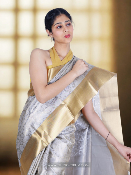 Navya: Golden Silver Tissue Silk Saree