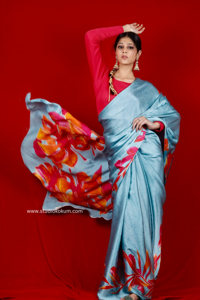 Scarlet Sky: Blue Floral Print Satin Silk Saree