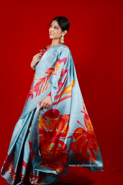 Scarlet Sky: Blue Floral Print Satin Silk Saree