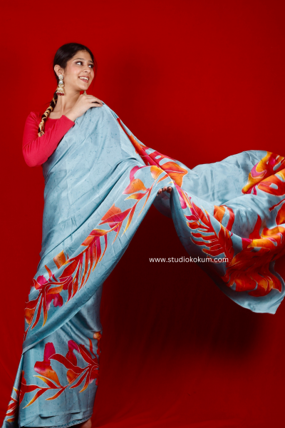Scarlet Sky: Blue Floral Print Satin Silk Saree