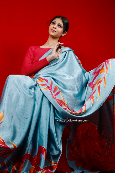 Scarlet Sky: Blue Floral Print Satin Silk Saree