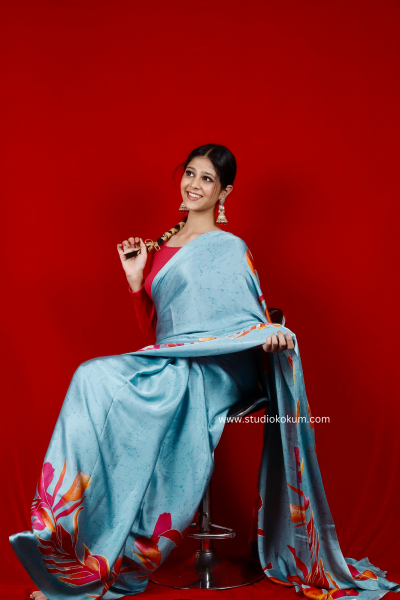 Scarlet Sky: Blue Floral Print Satin Silk Saree