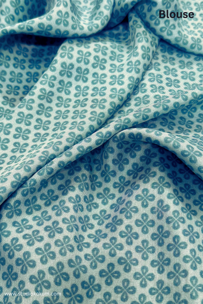 Scarlet Sky: Blue Floral Print Satin Silk Saree