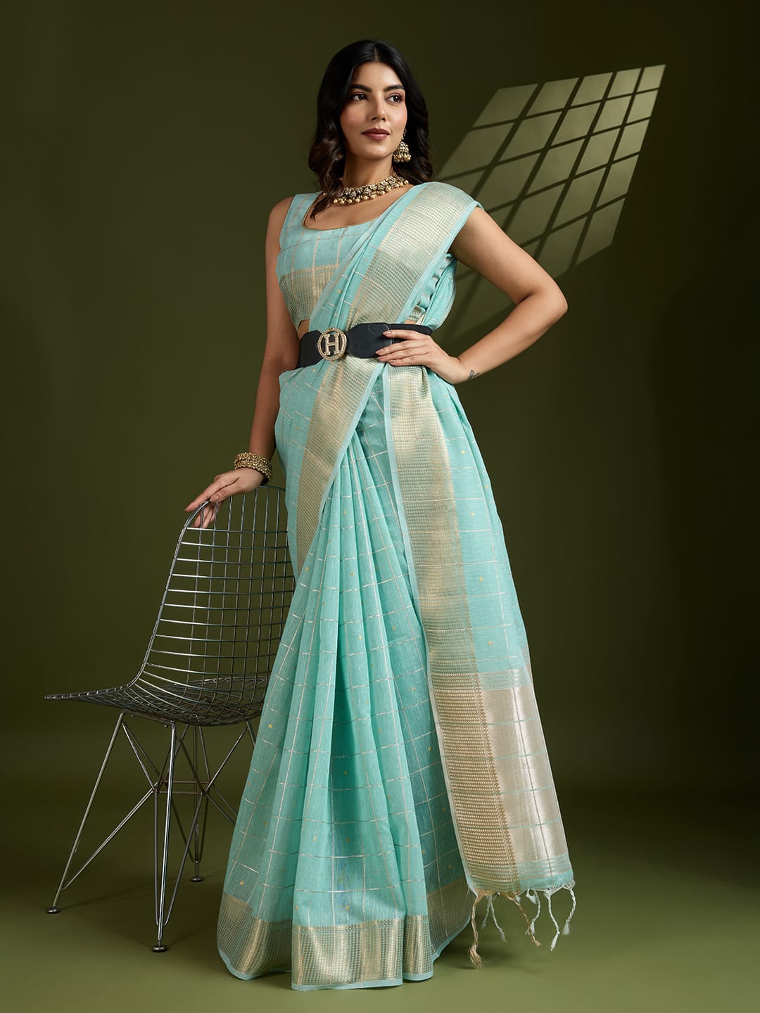 Sky Blue Pure Linen Tissue Silk Check Weaved Body Rich Zari Weaved Pallu Border Saree