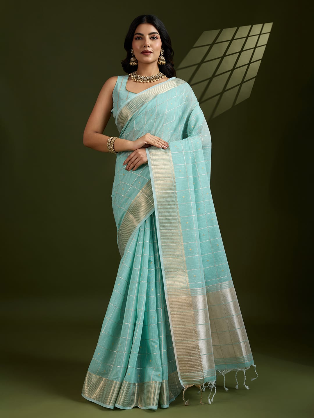 Sky Blue Pure Linen Tissue Silk Check Weaved Body Rich Zari Weaved Pallu Border Saree