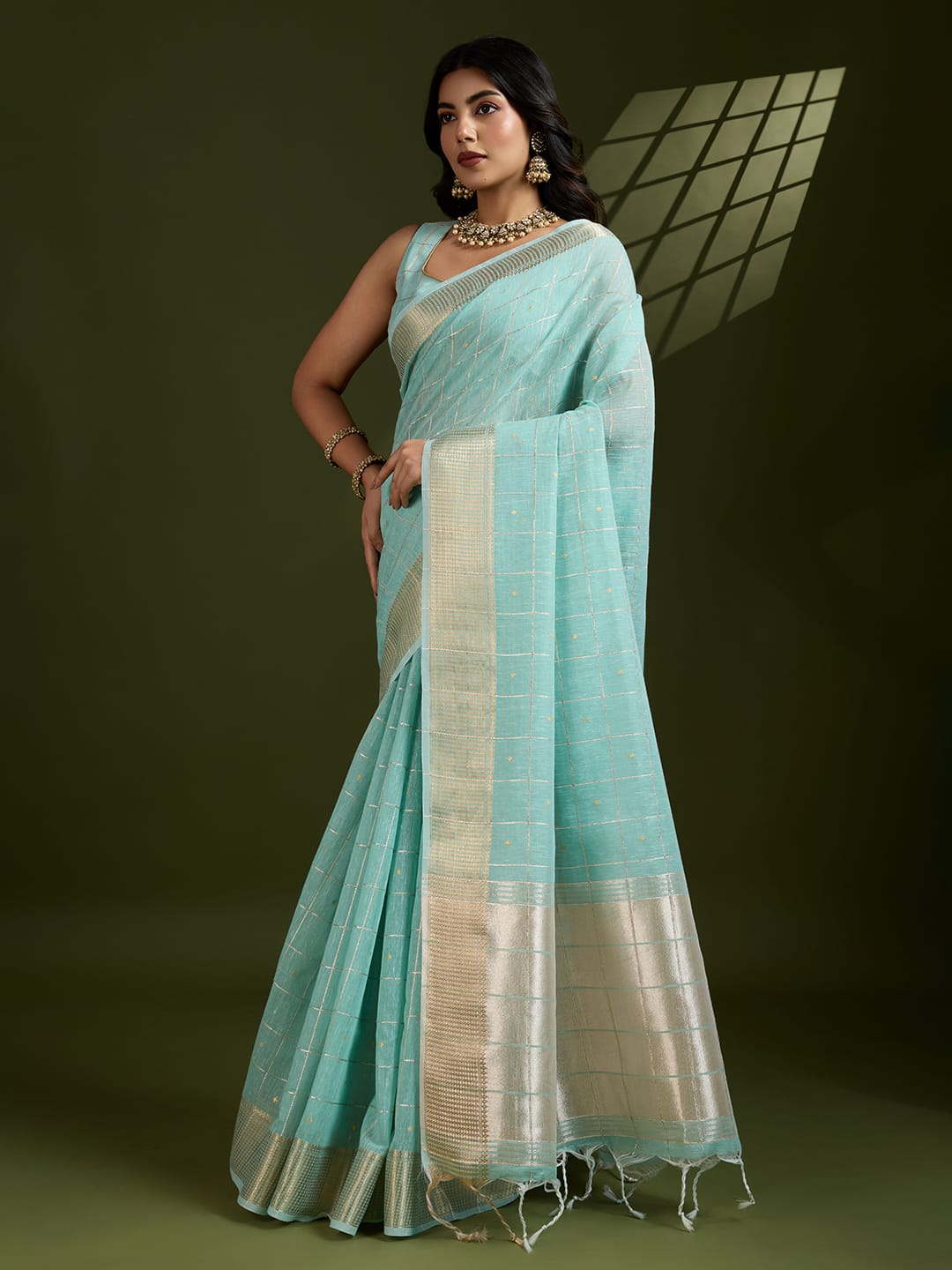 Sky Blue Pure Linen Tissue Silk Check Weaved Body Rich Zari Weaved Pallu Border Saree