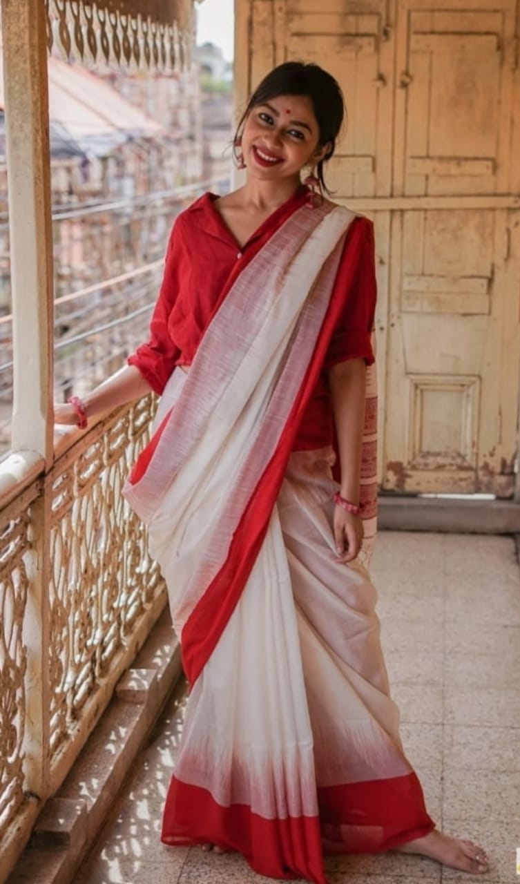 Pure Linen Resham Weaved Saree With Red Border And Tassels