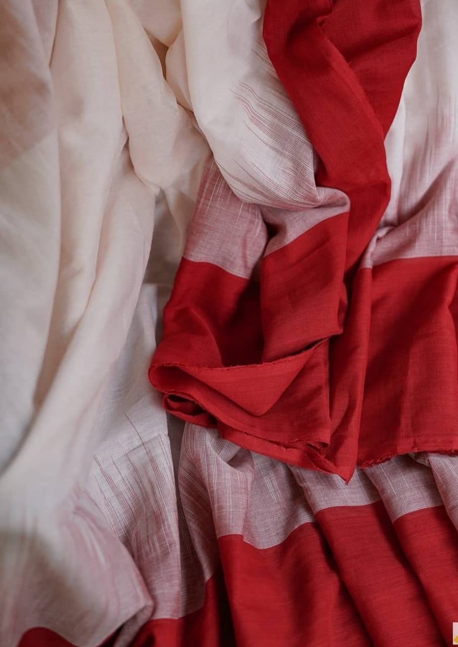 Pure Linen Resham Weaved Saree With Red Border And Tassels