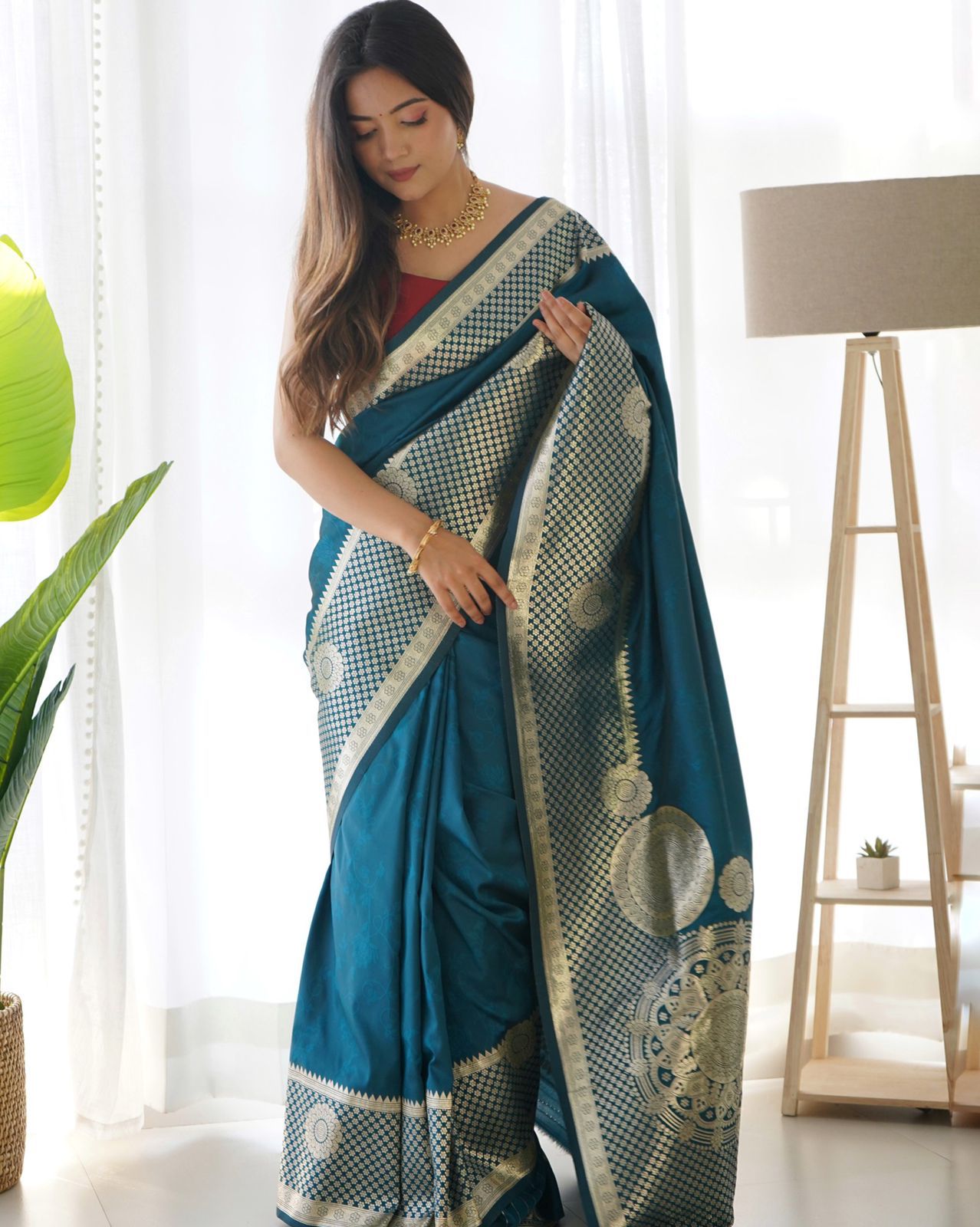Teal Banarasi Silk Plain Saree With Wide Zari Brocade And Rich Pallu