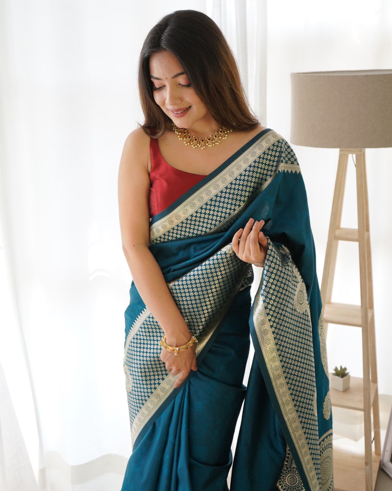 Teal Banarasi Silk Plain Saree With Wide Zari Brocade And Rich Pallu