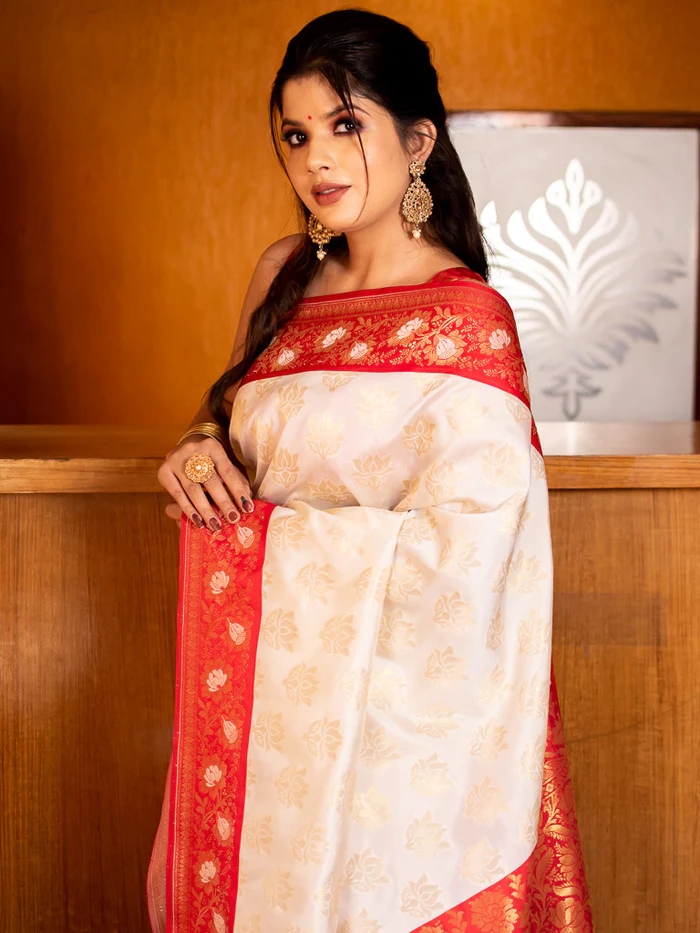 Off White Banarasi Silk All Over Zari Weaved Rich Pallu And Border Saree