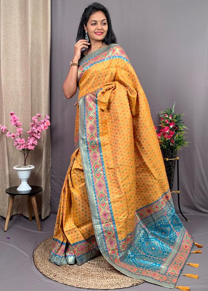 Pure Patola Silk All Over Rich Meenakari Weaved And Rich Zari Border Saree