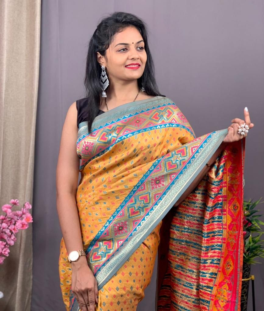 Pure Patola Silk All Over Rich Meenakari Weaved And Rich Zari Border Saree