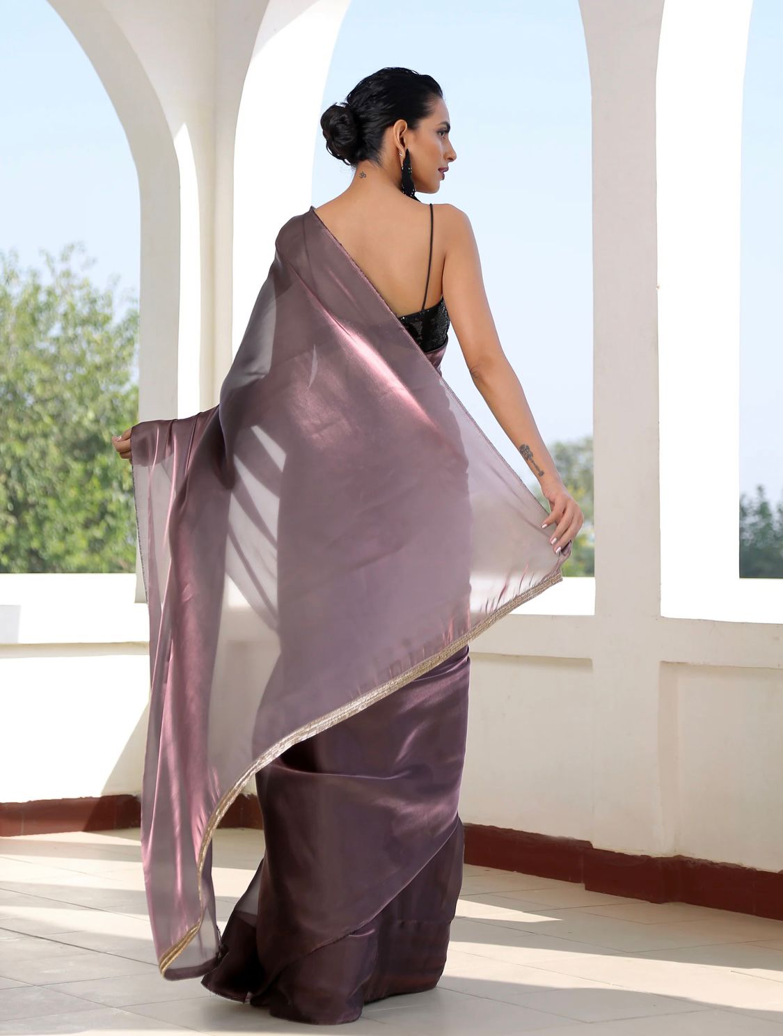 Metallic Polish Silk All Over Plain Saree With Latkans On Pallu
