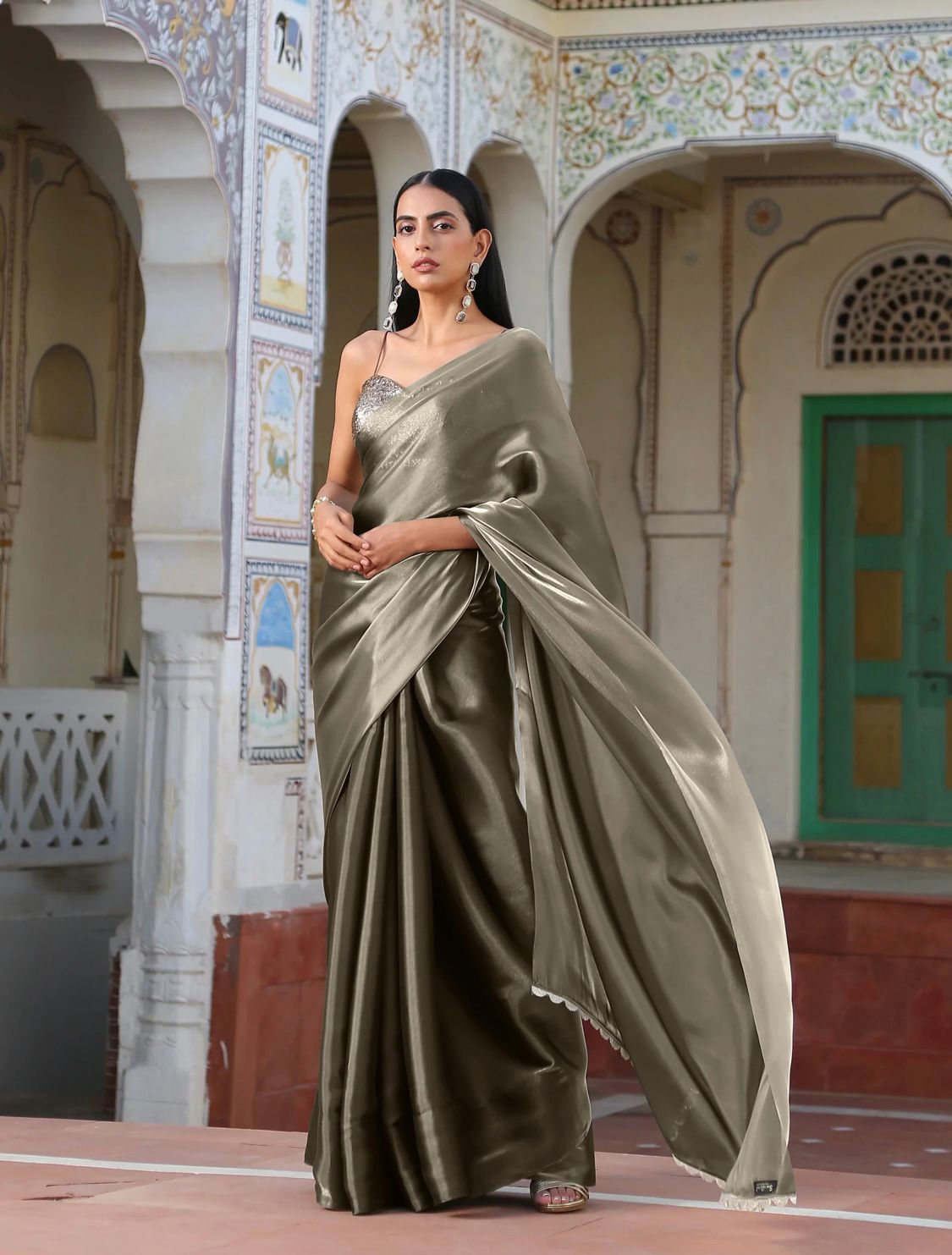 Metallic Polish Silk All Over Plain Saree With Latkans On Pallu
