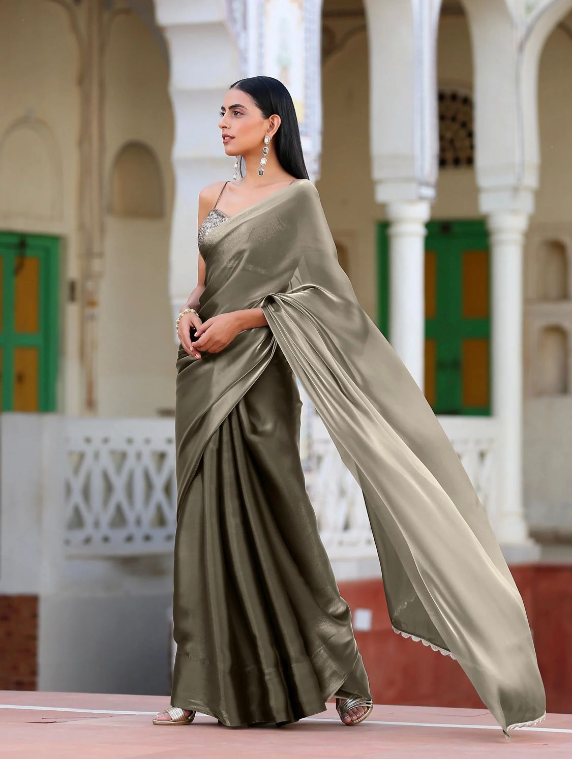 Metallic Polish Silk All Over Plain Saree With Latkans On Pallu