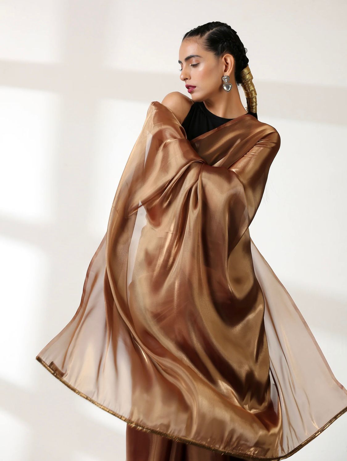 Metallic Polish Silk All Over Plain Saree With Latkans On Pallu