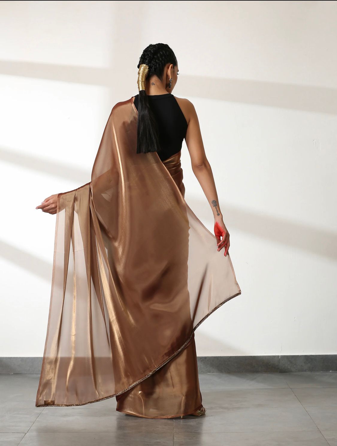 Metallic Polish Silk All Over Plain Saree With Latkans On Pallu