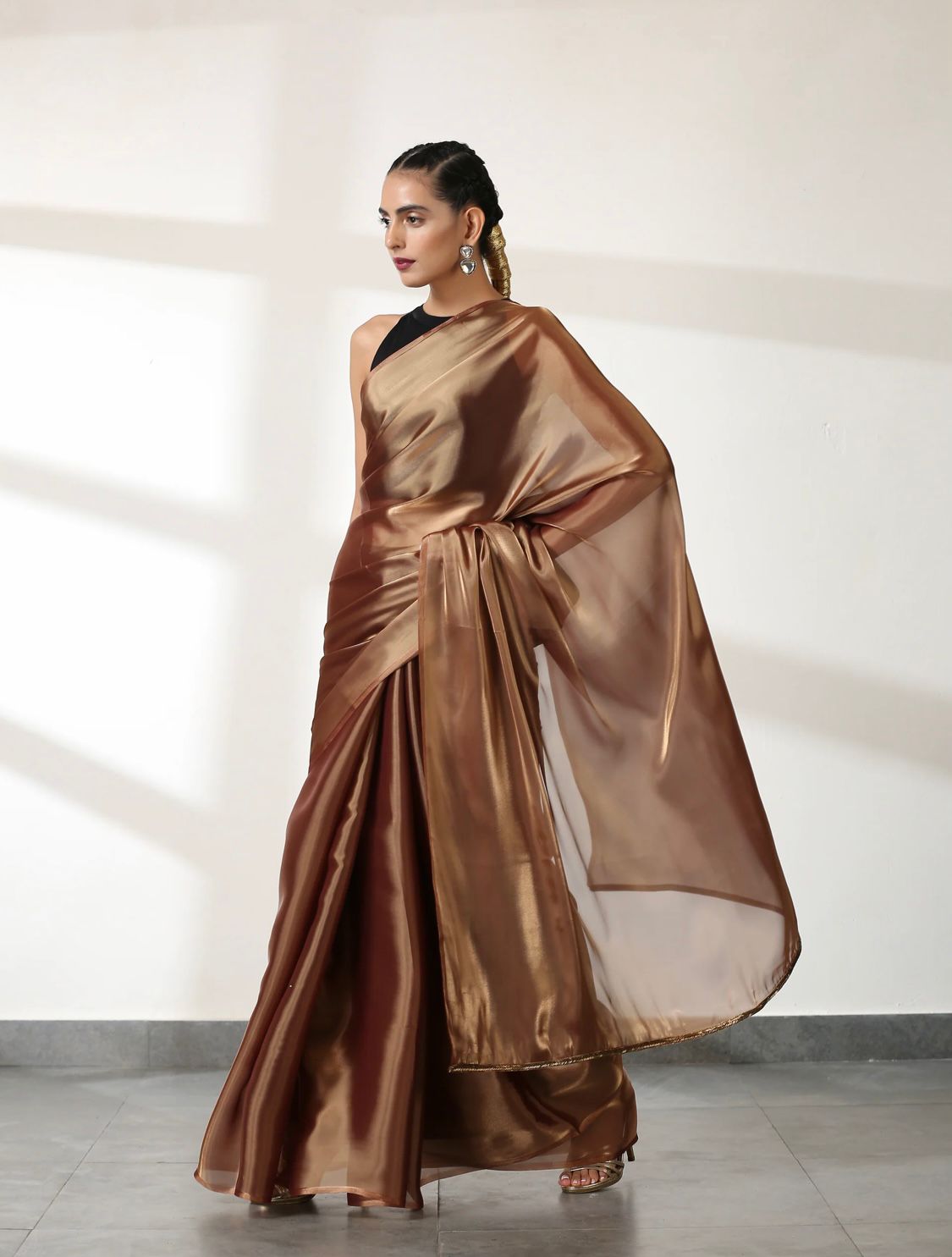 Metallic Polish Silk All Over Plain Saree With Latkans On Pallu