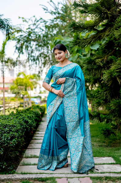 Image of Teal Handloom Silk Kalamkari Weaved Rich Pallu Border Saree