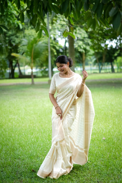Image of Off-White Banarasi Soft Silk All Over Weaved Zari Lining Rich Pallu Border Saree