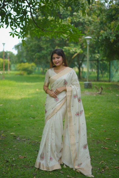 Image of Off-White Soft Jute Silk Thread Embroidered Body Zari Weaved Pallu Border Saree