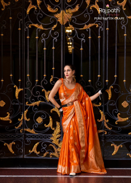 Image of Orange Pure Banarasi Satin Crape Silk Rich Zari Weaved Pallu Saree