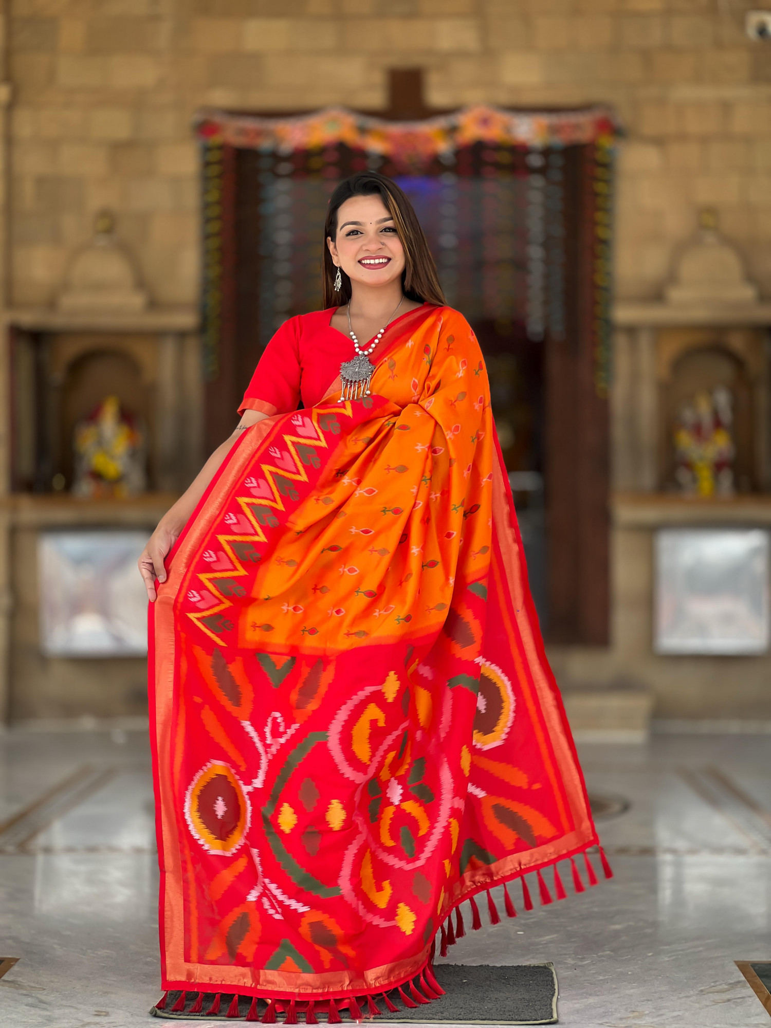 Orange Soft Silk Ikkat And Patola Concept Weaved Contrast Pallu Saree