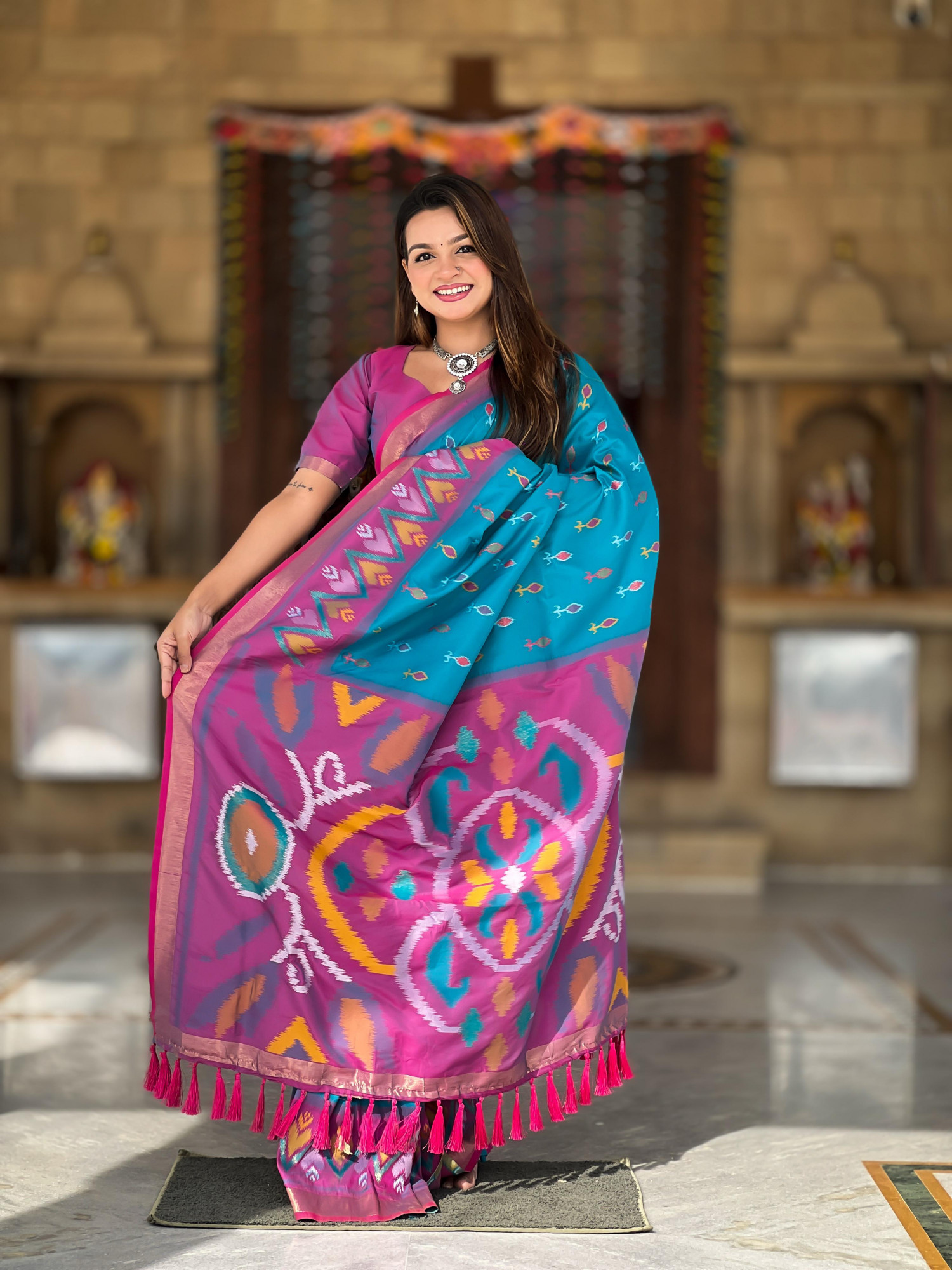 Teal Soft Silk Ikkat And Patola Concept Weaved Contrast Pallu Saree