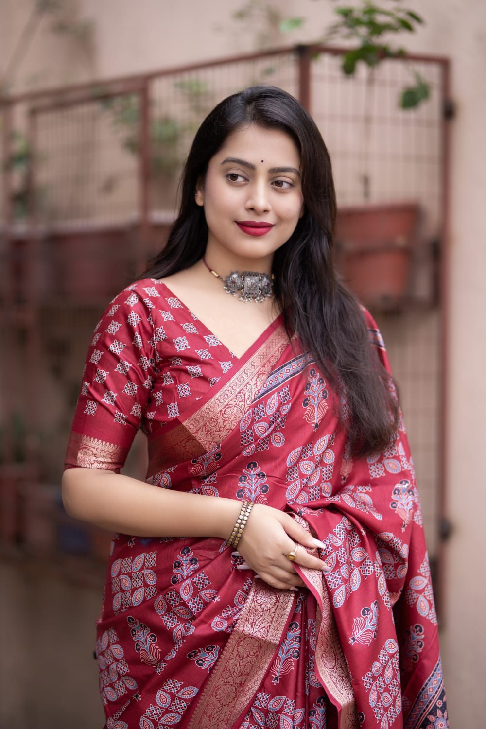 Maroon Soft Cotton Silk Ajrakh Printed With Gold Zari Border Saree